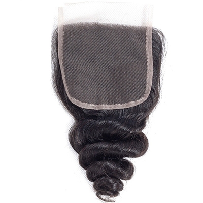 Estensione dei capelli umani 4x4 Chiusura in pizzo senza adesivo Curva a onde sciolte Perrucca Remy Hair Grade
